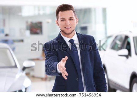 Car salesman in dealership