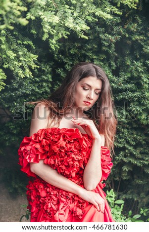 http://thumb1.shutterstock.com/display_pic_with_logo/1374529/466781630/stock-photo-beautiful-young-woman-in-red-dress-outdoor-466781630.jpg