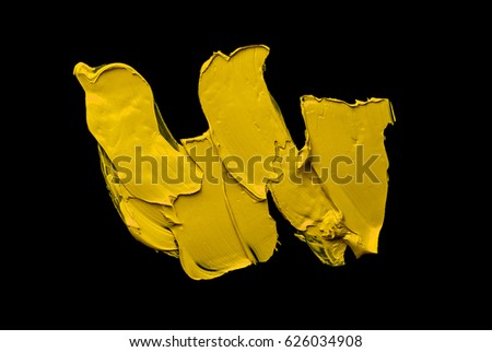 YELLOW spot oil paint on black
