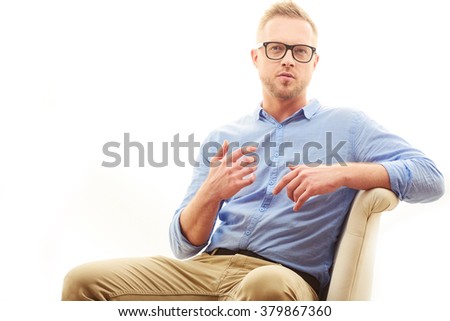 [fb] les angélus // jola&monsiame Stock-photo-talking-young-man-portrait-of-handsome-young-man-in-casual-blue-shirt-and-dioptrical-glasses-379867360