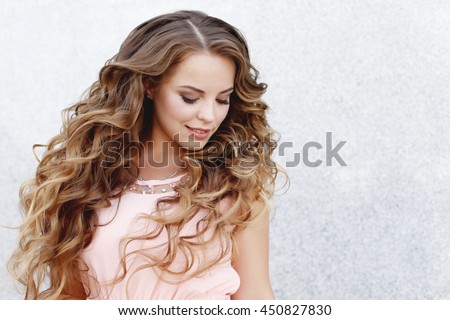  long curly hairProfessional makeup and hairstyle , stylish woman