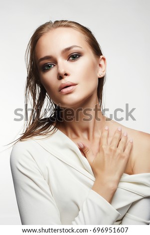 https://thumb1.shutterstock.com/display_pic_with_logo/1411597/696951607/stock-photo-beautiful-woman-with-wet-hair-and-make-up-model-girl-in-white-dress-fashion-beauty-make-up-696951607.jpg