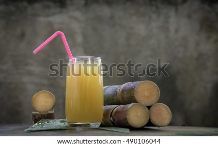 Piece of sugarcane juice over white background