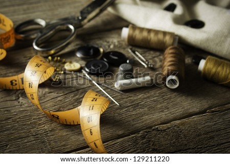 Sewing accessories on wooden table