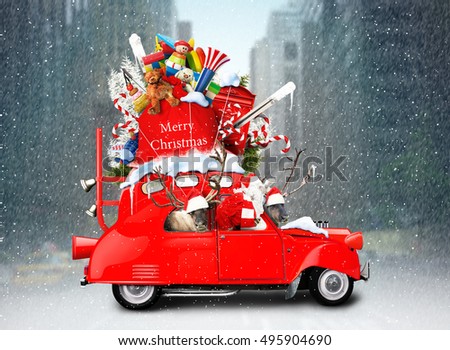 Santa Claus with reindeer in a car with gifts