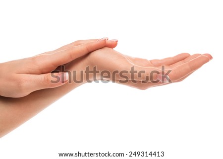 Beautiful hands with french manicure on white background