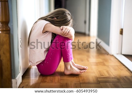 Sad Little Girl Sitting Near Wall Stock Photo 118324897 - Shutterstock