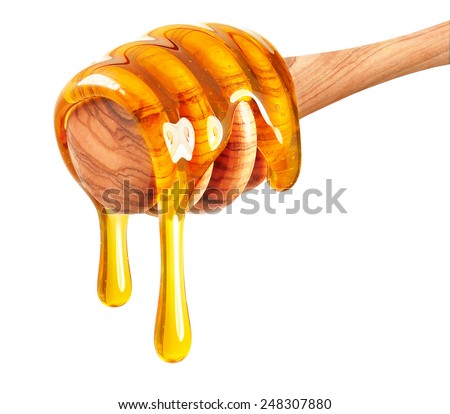 Honey dripping isolated on white