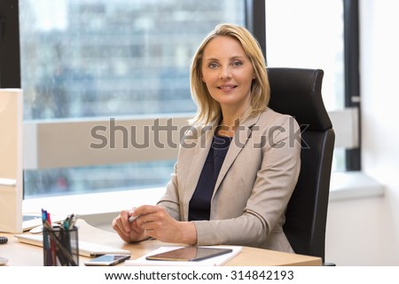 Portrait of a attractive business woman at office