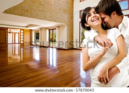 https://thumb1.shutterstock.com/display_pic_with_logo/152080/152080,1280161468,7/stock-photo-young-happy-couple-at-their-new-house-57870043.jpg
