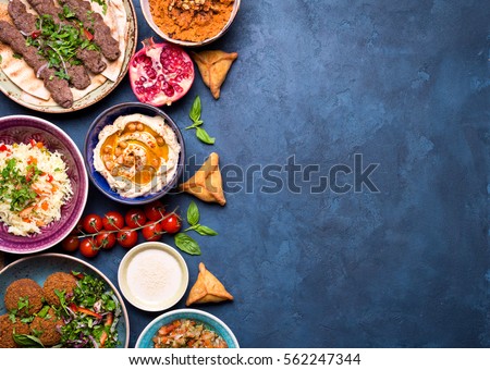Middle Eastern Or Arabic Dishes And Assorted Meze On Concrete Rustic Background Meat Kebab Middle Eastern Or Arabic Dishes And Assorted Meze On Concrete Rustic Background Meat Kebab