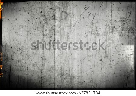 Blank grained and scratched film strip texture background