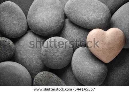 Heart made of stone on natural stones