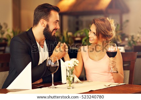 https://thumb1.shutterstock.com/display_pic_with_logo/158350/523240780/stock-photo-picture-of-romantic-couple-dating-in-restaurant-523240780.jpg
