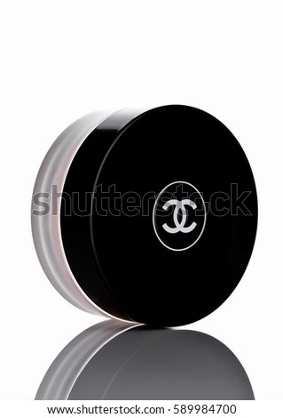 LONDON, UK - FEBRUARY 28, 2017 Chanel face cream container with black logo. On white background with reflection