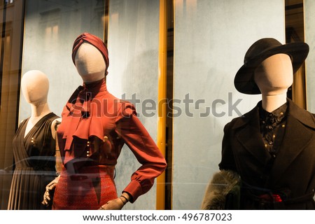 Milan, Italy - October 9, 2016: Shop window and entrance of a Gucci shop in Milan - Montenapoleone street, Italy. Few days after Milan Fashion Week. Fall Winter 2017 Collection.