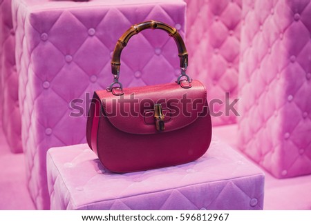 Milan, Italy - February 28, 2017: Shop window of a Gucci shop in Milan - Montenapoleone area, Italy. Few days after Milan Fashion Week. Gucci Bags Spring Summer 2017 Collection.
