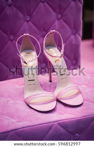 Milan, Italy - February 28, 2017: Shop window of a Gucci shop in Milan - Montenapoleone area, Italy. Few days after Milan Fashion Week. Gucci Shoes Spring Summer 2017 Collection.