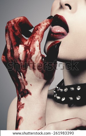 Sexy Young Woman Licks Blood Against Stock Photo (Royalty Free ...