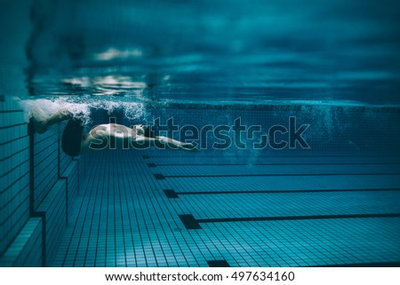 Inside Pool fit swimmer training swimming pool professional stock photo Inside Pool fit swimmer training swimming pool professional stock photo