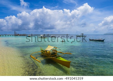 Yellow Fishing Boat In A Tropical Island Harbor Yellow Fishing Boat In A Tropical Island Harbor