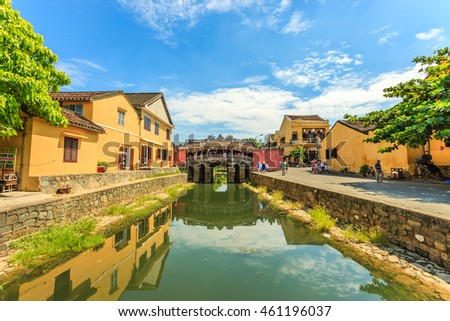 Hoi An, central Vietnam. July 20, 2016 : Ancient Vietnamese city of Hoi An. River in the city center. The background is a historic landmark Japanese Bridge. Hoi An, Vietnam
