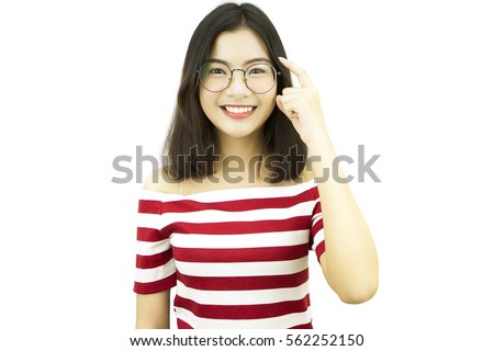 Asian woman smile and relax with happy face, wear eye glasses, isolated white background, pose by young beautiful girl with red white horizontal stripe casual dress at portrait studio.