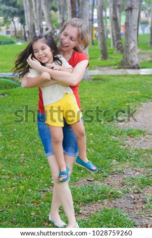 mother having fun Latin mother having fun Latin