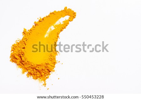 Smear of turmeric. Isolated on white. Up view. Empty space for text or inscription.