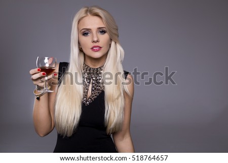 https://thumb1.shutterstock.com/display_pic_with_logo/165793/518764657/stock-photo-woman-and-happy-new-year-s-eve-concept-beautiful-woman-in-evening-dress-with-cocktail-show-518764657.jpg