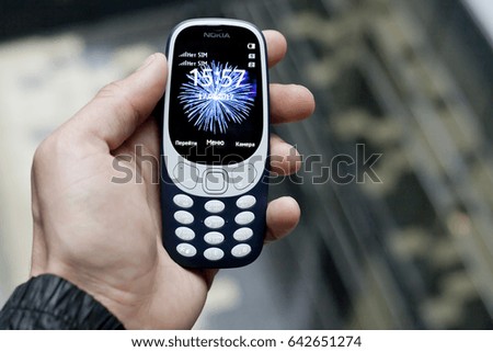 Moscow, Russia - May 17, 2017: Mobile phone Nokia 3310 in hand.