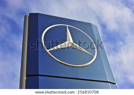 MAINZ,GERMANY-FEB 20:Mercedes-Benz logo in the blue sky on February 20,2015 in Mainz,Germany.Is a German luxury automobile manufacturer, a multinational division of the German manufacturer Daimler AG