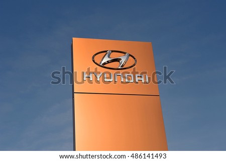 GERMANY-SEPT 15: HYUNDAI logo in the blue sky on September 15,2016 in ,Germany.Hyundai is a South Korean multinational automotive manufacturer headquartered in Seoul, South Korea.