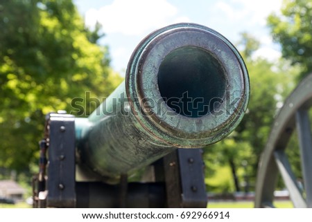 Very old artillery canon in a park