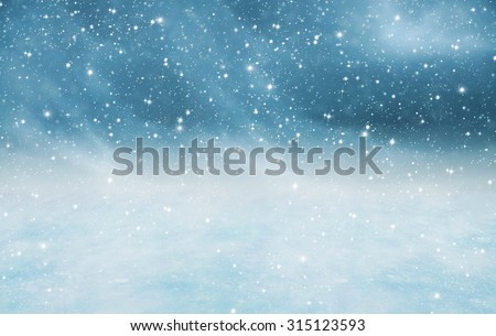Winter landscape with falling snow