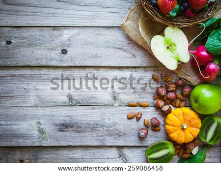 Fruits and vegetables on rustic background