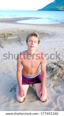 Boy wearing swimming shorts — Stock Photo © Smirno #34865889
