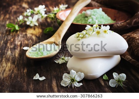 aromatic soap and salt on the old wooden background. aromatherapy spa concept