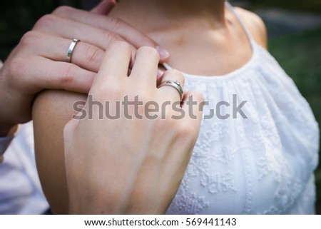 https://thumb1.shutterstock.com/display_pic_with_logo/170529736/569441143/stock-photo-hands-of-married-couple-with-rings-569441143.jpg