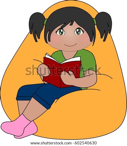 Girl Is Holding A Book While Sitting On Bean Bag Girl Is Holding A Book While Sitting On Bean Bag