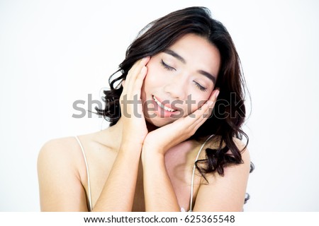https://thumb1.shutterstock.com/display_pic_with_logo/172084162/625365548/stock-photo-young-asian-lady-boy-closed-her-eyes-and-lifted-her-hands-to-her-cheeks-young-beautiful-asian-625365548.jpg