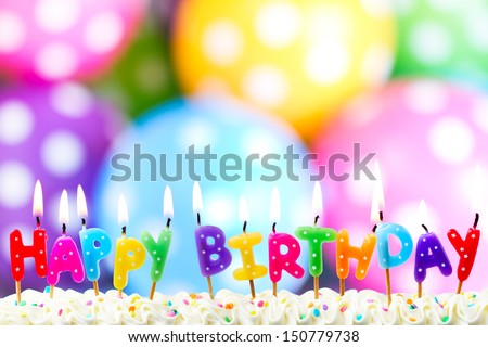 Colorful happy birthday candles - stock photo