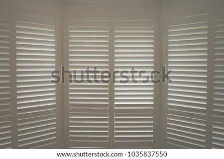 Luxury White Indoor Plantation Shutters Closed Stockfoto (Lizenzfrei ... Luxury White Indoor Plantation Shutters Closed Stockfoto (Lizenzfrei ...
