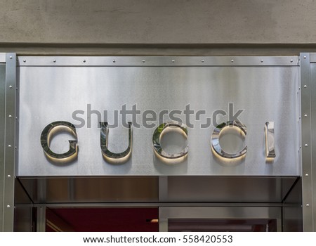 PARIS, FRANCE - August 6, 2016:Gucci store with its signage on facade.Gucci is an Italian fashion and leather goods brand, part of the Gucci Group, which is owned by the French holding company Kering.