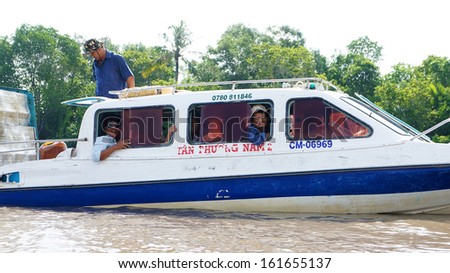 CA MAU, VIET NAM- JUNE 29: Speedboat moving on river in unsafe of river traffic situation in Ca Mau, Viet Nam on June 29, 2013