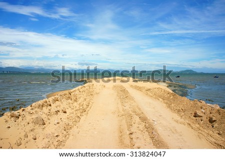 Reclamation project at Quy Nhon, Binh Dinh, Viet Nam, fill up sand on water to make construction plan, try to change nature for human profit, fill soil at seaside