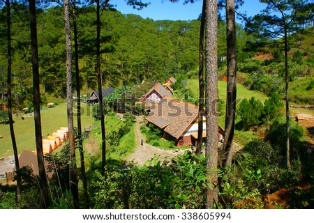 DA LAT, VIET NAM- NOV 9: Cu Lan village at Dalat countryside, hotel and holiday resort among pine jungle, camp on grass field, an eco tourism in nature reserse, Dalat, Vietnam, Nov 9, 2015
