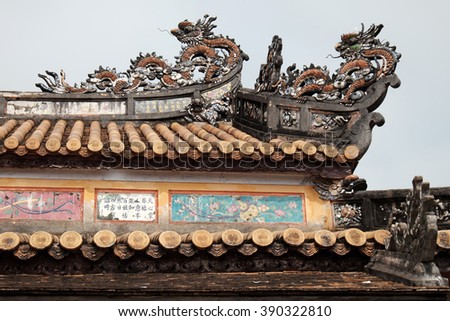 HUE, VIET NAM- FEB 19, 2016: Citadel, an culture heritage with Hoang Thanh (Imperial City),Tu Cam Thanh (Forbidden City), Dai Noi (Inner city), ngo mon (noon gate), detail of roof of ancient Vietnam