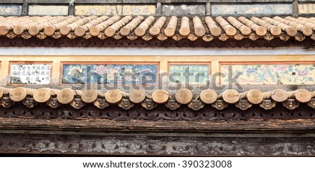 HUE, VIET NAM- FEB 19, 2016: Citadel, an culture heritage with Hoang Thanh (Imperial City),Tu Cam Thanh (Forbidden City), Dai Noi (Inner city), ngo mon (noon gate), detail of roof of ancient Vietnam