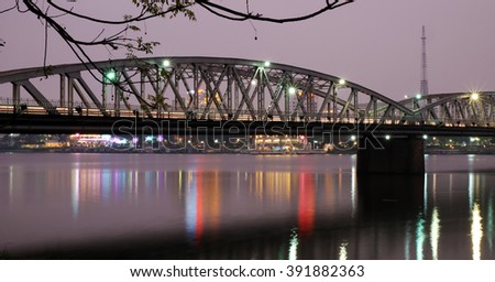 HUE, VIET NAM- FEB 19, 2016: Truong Tien Bridge, cross Huong river, an old bridge link with history, Trang Tien brigde reflect on water, old architect, make from steel, landscape at evening, Vietnam